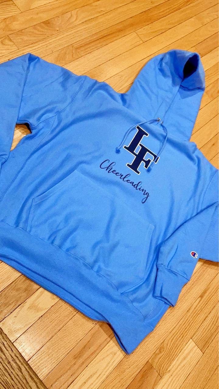 Light blue Champion hoodie with embroidered LF Cheerleading design